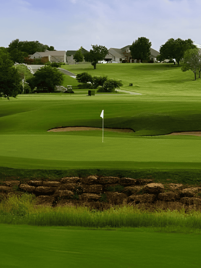 Impressive golf course with lush greens and scenic landscape.