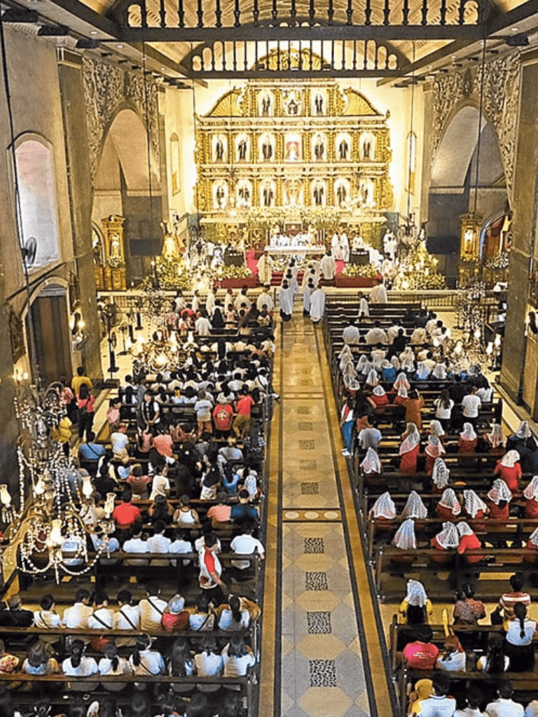 Adoration church interior with congregation and ornate gold altar, religious worship, community gathering, spiritual service.
