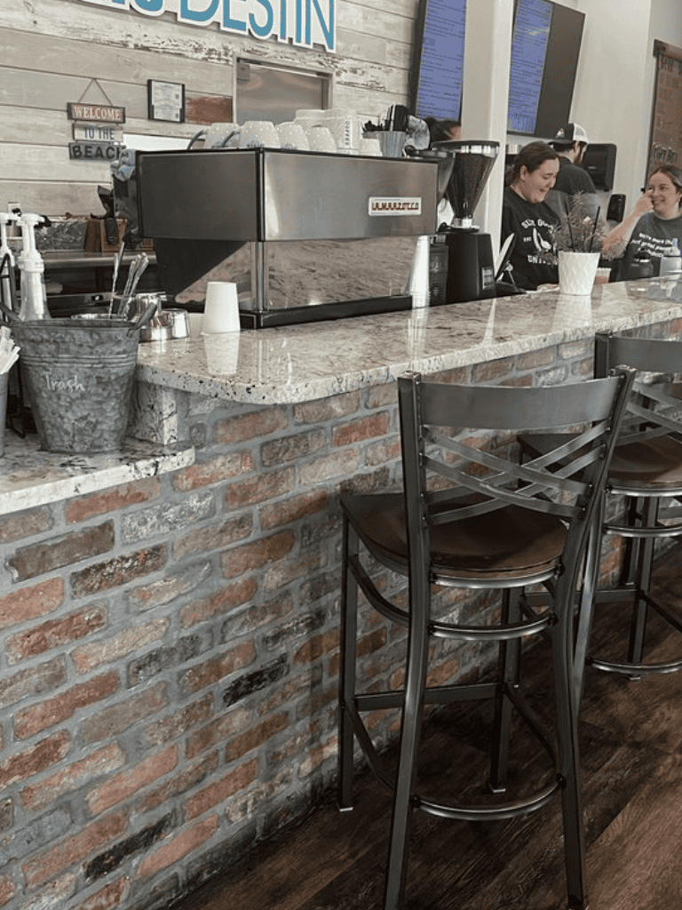 Espresso coffee machine at a modern cafe counter.