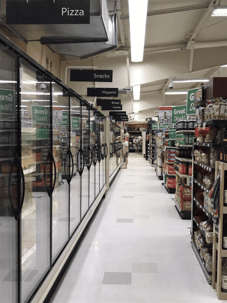 Pizza, snacks, Hispanic, bread, kosher, potatoes, chicken, seafood aisle at grocery store.