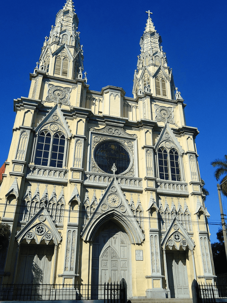 Intricate Gothic cathedral with towering spires and detailed stonework, exemplifying historic religious architecture.
