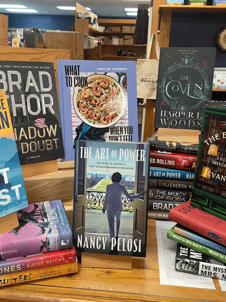 Aromatherapy books display at a bookstore, featuring bestsellers and new titles for inspiration and relaxation.