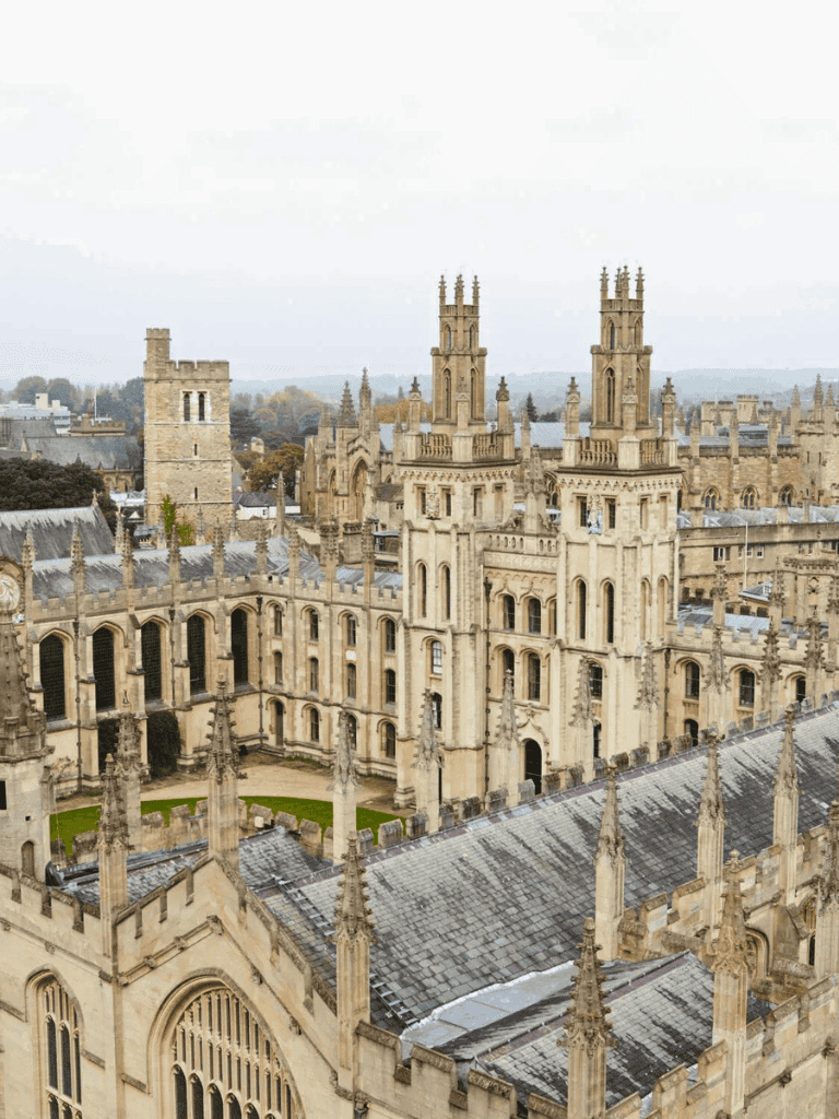 Historic Gothic cathedral with towering spires and intricate stone architecture in Oxford, England.