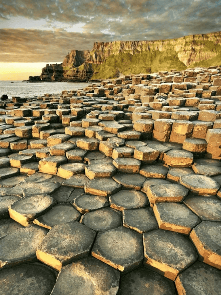Hexagonal Basalt Columns at Giant's Causeway, Ireland, scenic natural geological site.