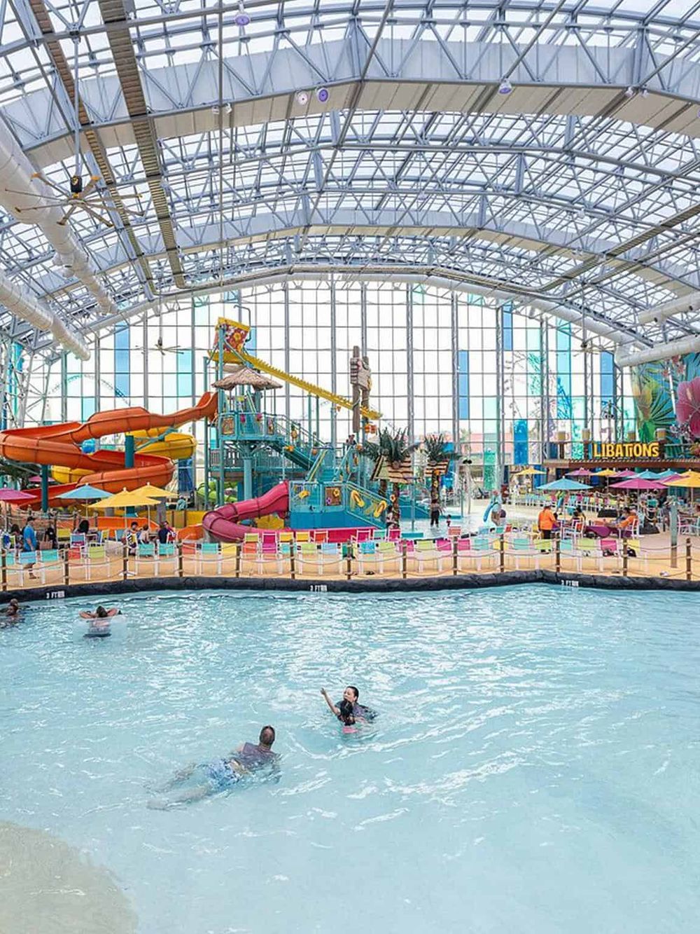 Indoor water park with slides and pool, family fun activities, QuestForDirections.