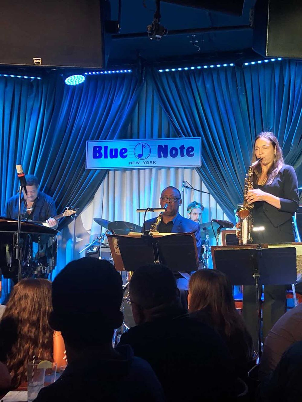 Live jazz performance at Blue Note NYC, showcasing talented musicians in an iconic jazz venue.
