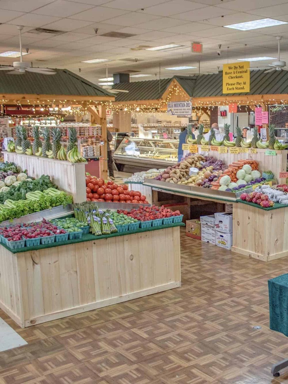 Vibrant farmer's market produce section with fresh fruits and vegetables at QuestForDirections.