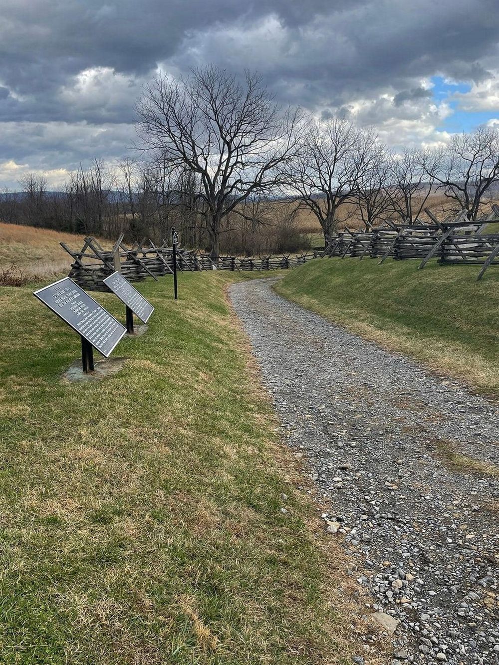 Historic Civil War trail with interpretive plaques and rugged gravel path.