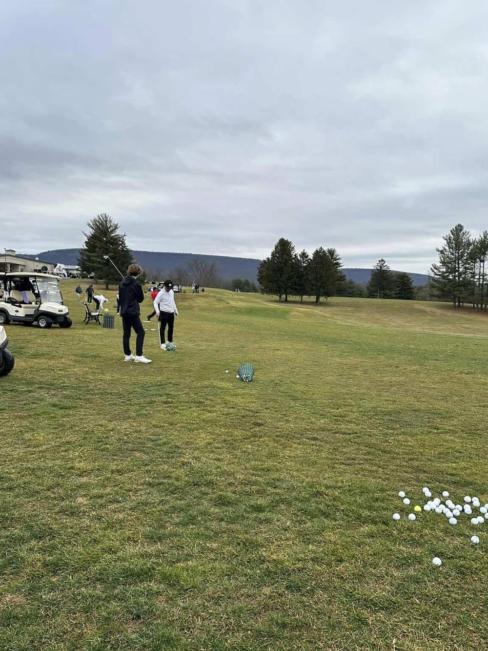 Golf practice on a cloudy day at Quest For Directions golf course.