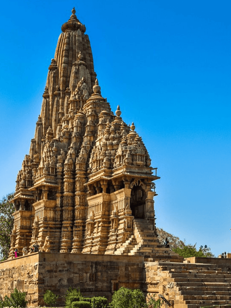 Intricate Hindu temple architecture in India with ornate carvings and towering spires.