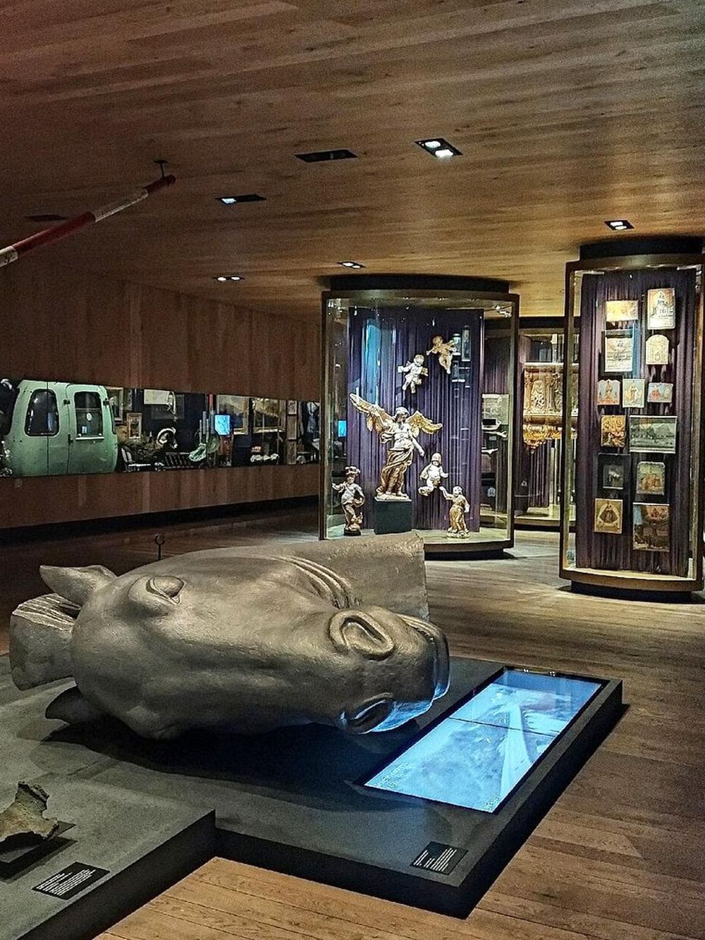 Beautiful museum exhibit showcasing religious artifacts and sculptures. Ideal for art lovers and history enthusiasts exploring local culture.