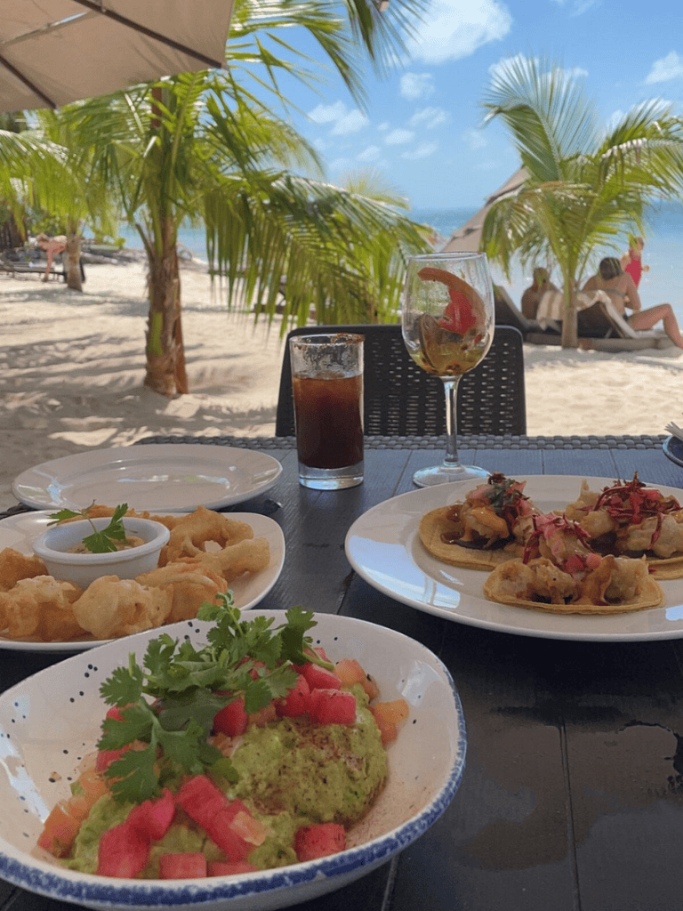 Fresh beachside dining with tropical dishes and drinks at QuestForDirections. Perfect seaside meal.