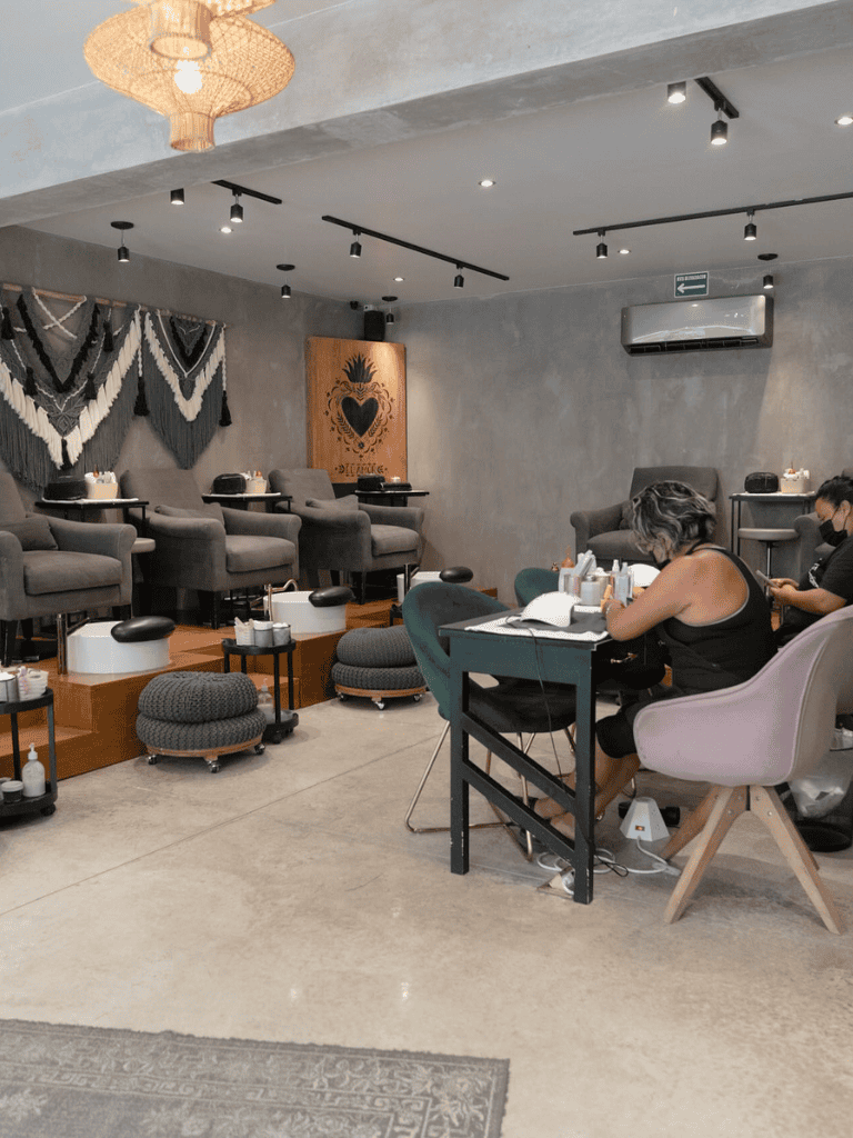 Modern nail salon interior with pedicure stations and relaxing ambiance.