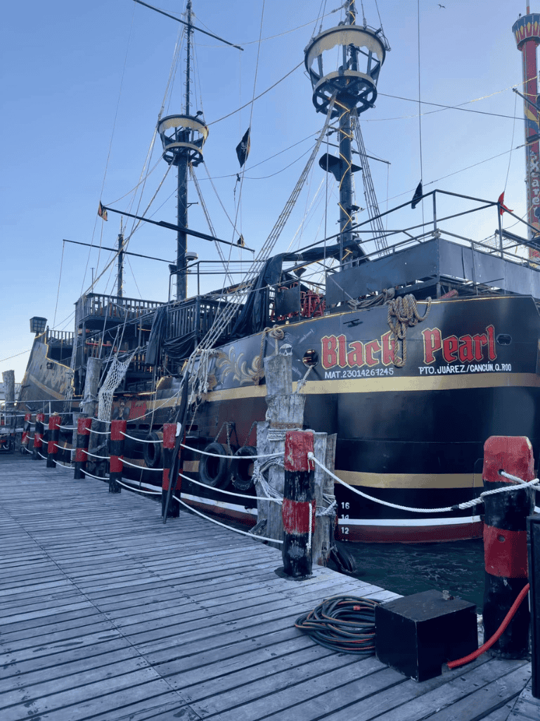 Pirate ship attraction at Cancun pier, themed for family fun, adventure, and entertainment in Mexico.
