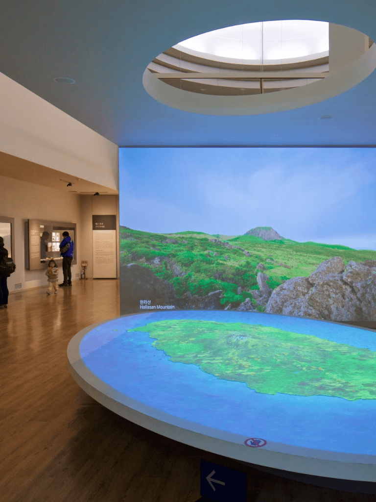 Vivid digital landscape exhibit of Hallasan Mountain at Quest for Directions museum.