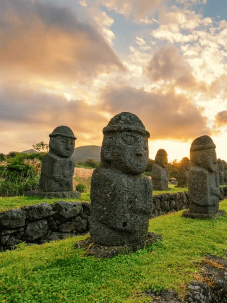 Ancient Moai statues in Easter Island at sunset, UNESCO World Heritage Site, travel destination, cultural heritage, moai statues.