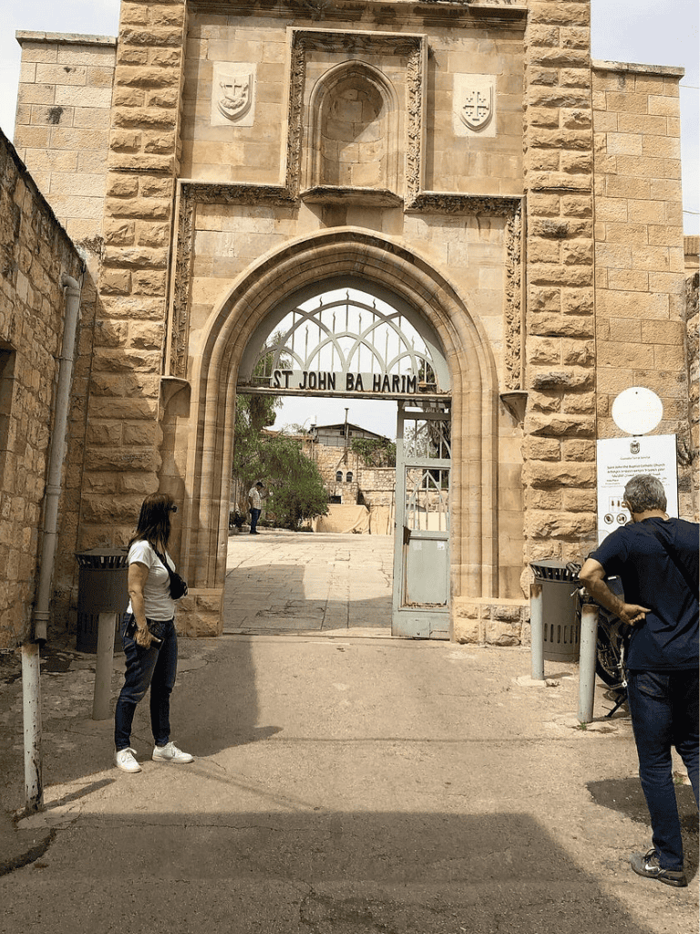Ancient stone archway entrance at St. John Ba Harim, historical site and landmark.