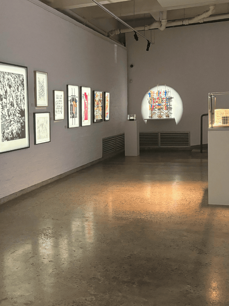 Abstract art and contemporary sculptures displayed in an art gallery.