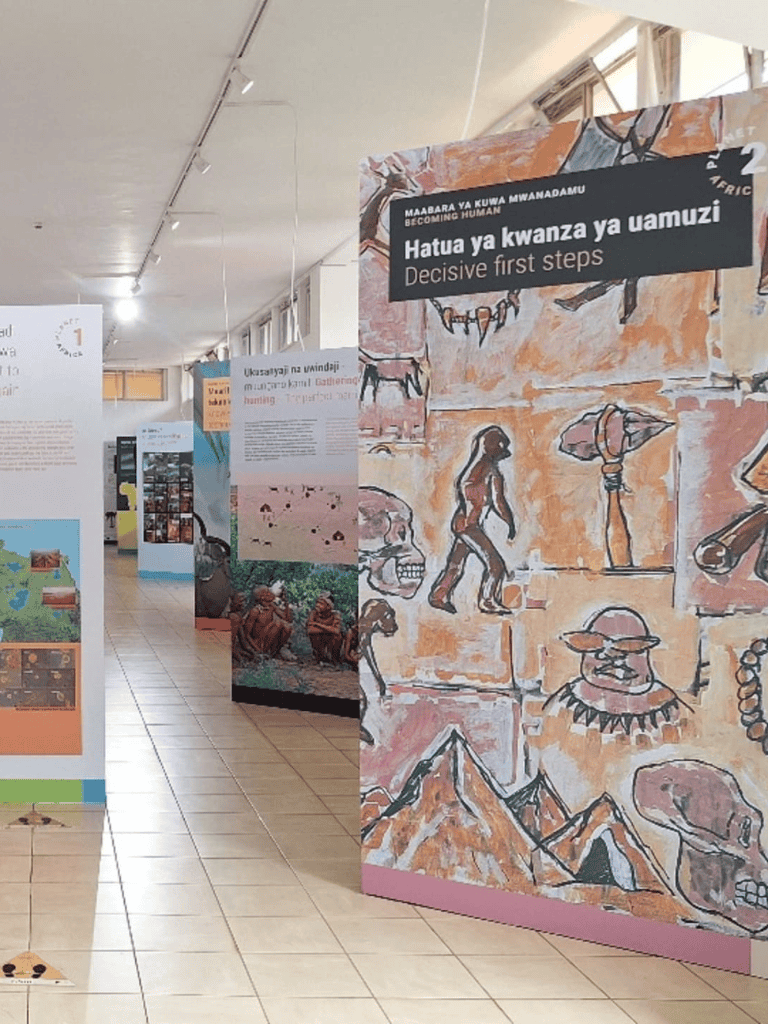 Decisive first steps mural at QuestForDirections exhibit focusing on African culture and history.