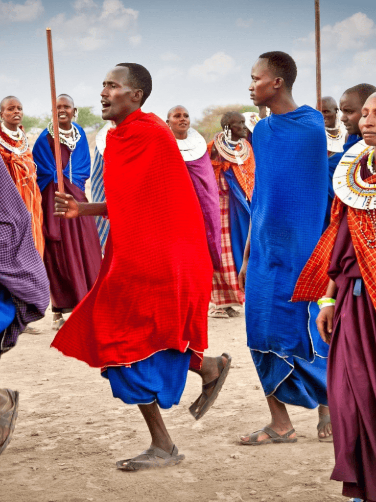 Vibrant Maasai community gathering, traditional attire showcases cultural richness and heritage.