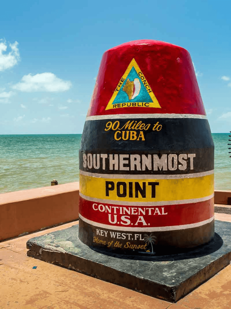 90 Miles to Cuba Southernmost Point Key West Florida landmark for travelers and tourists.