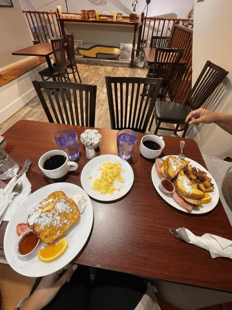 Buttermilk pancakes, breakfast, classic American breakfast, cozy diner, breakfast food, hearty breakfast, brunch, comfort food.