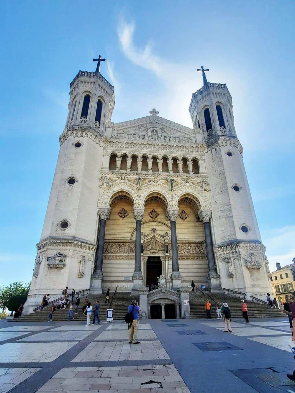 Impressive church front view with Romanesque architecture, popular tourist destination on QuestForDirections.