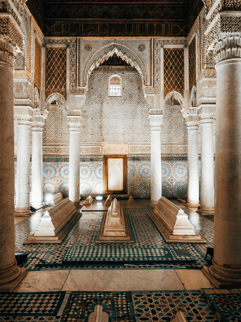 Ancient Moroccan tombs with intricate tile work and ornate architecture at QuestForDirections.