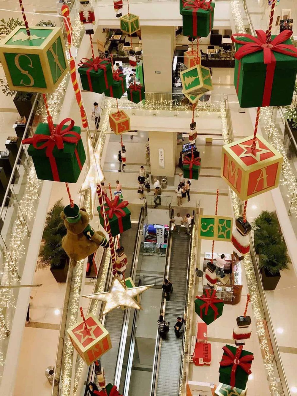 Festive gift box decorations in a shopping mall for Christmas holiday season.