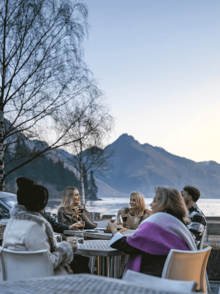 Enjoying outdoor dining with mountain views at QuestForDirections restaurant.