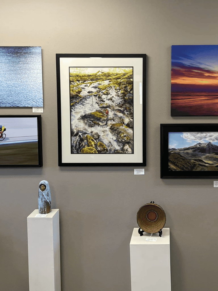 Tranquil creek landscape artwork in art gallery, nature-inspired wall decor for home or office.