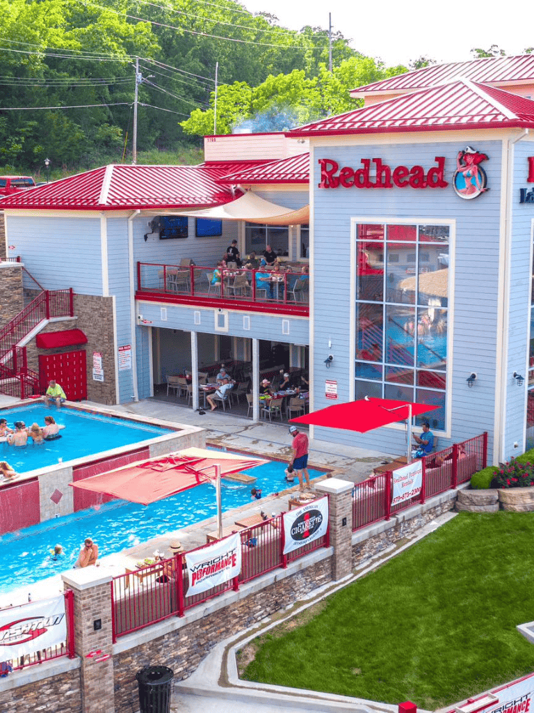 Outdoor pool at Redhead Lakehouse, popular for relaxation and family fun.
