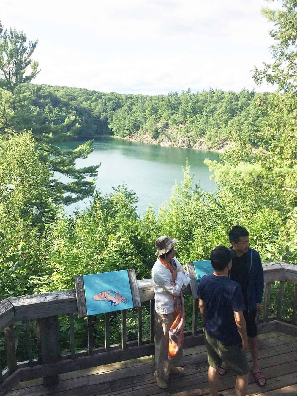 Scenic river view at Quest for Directions outdoor location, surrounded by lush green trees and nature.