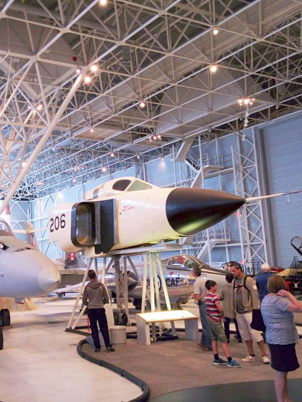 Vintage jet fighter on display at flight museum for aviation exploration and education.