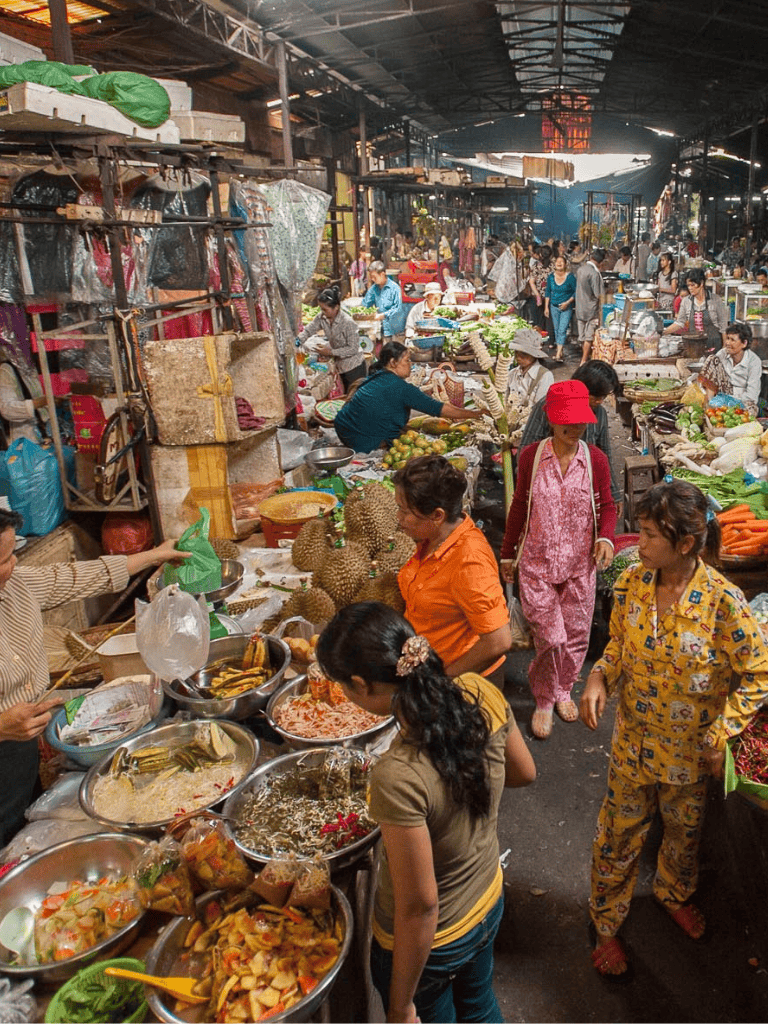 Fresh produce and vibrant market scene in QuestForDirections, showcasing local vendors and cultural shopping experience.