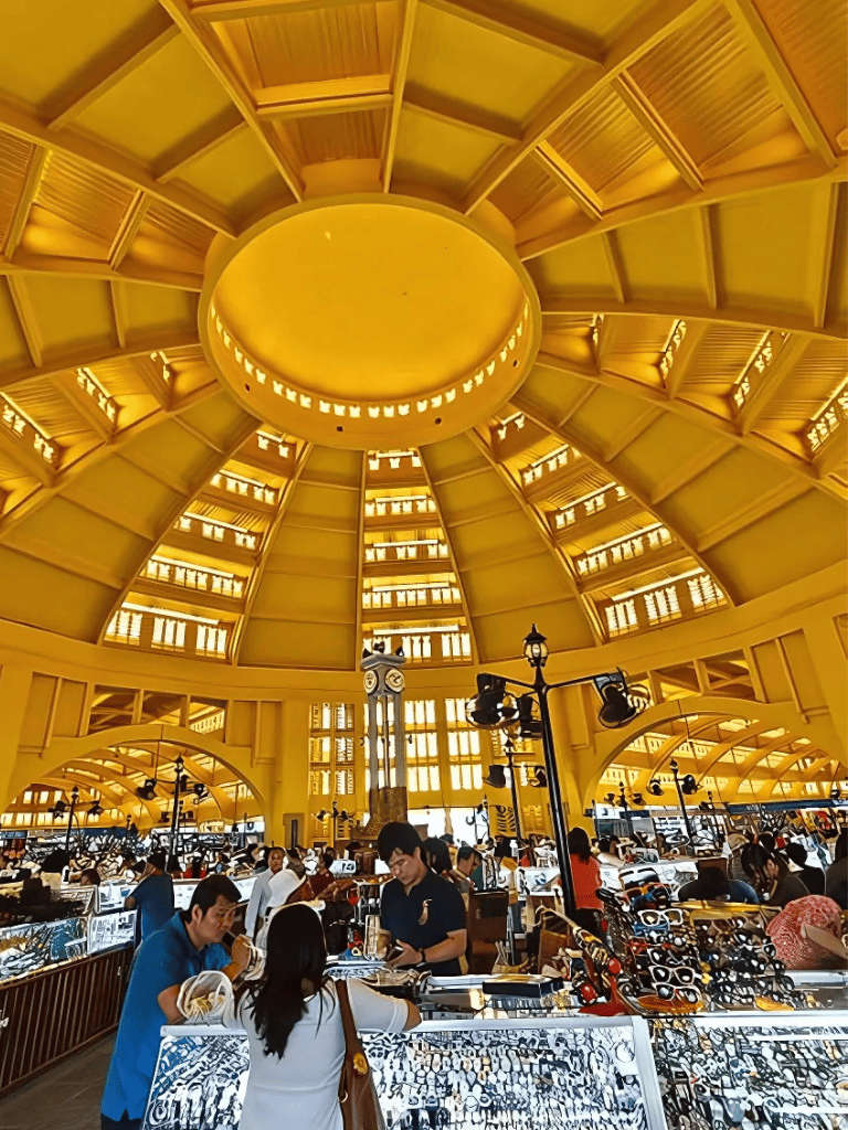 Golden dome architecture at QuestForDirections shopping mall, vibrant indoor market, stylish retail space, shopping attraction, retail environment.