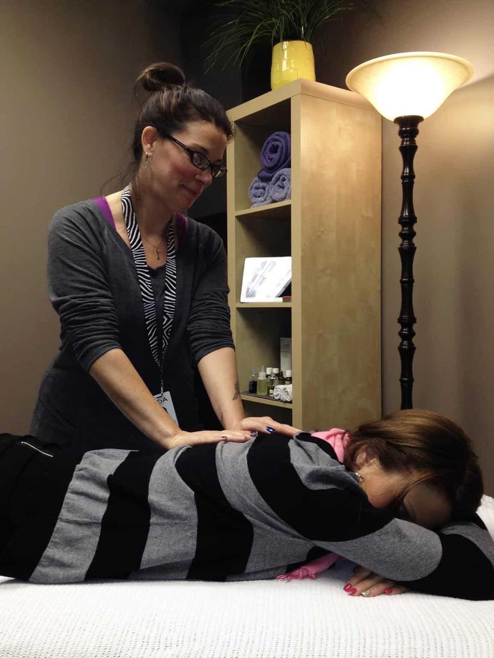 Relaxing massage therapy session at QuestForDirections wellness center.