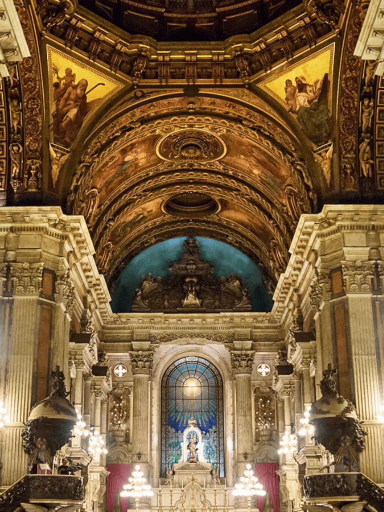 Eloquent Baroque church interior with ornate architecture and religious art.