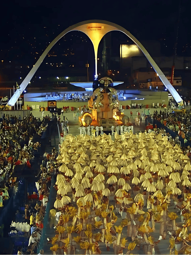 Crowd at the Quest For Directions event featuring traditional dancers and a modern stage at night.
