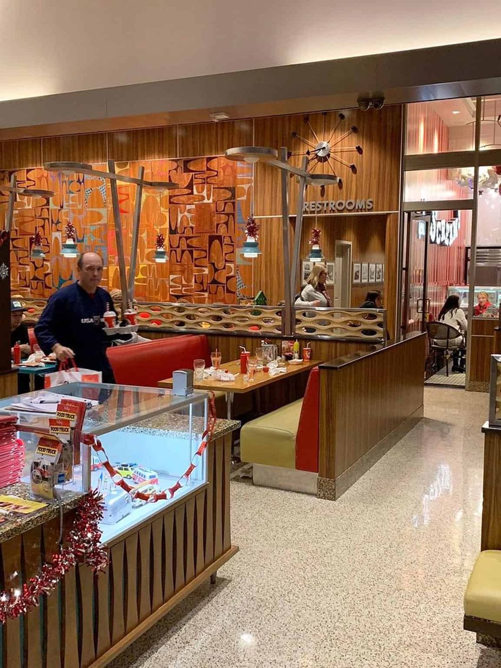 Colorful diner interior with wooden accents and vintage decor, showcasing QuestForDirections' optimal navigation tips.