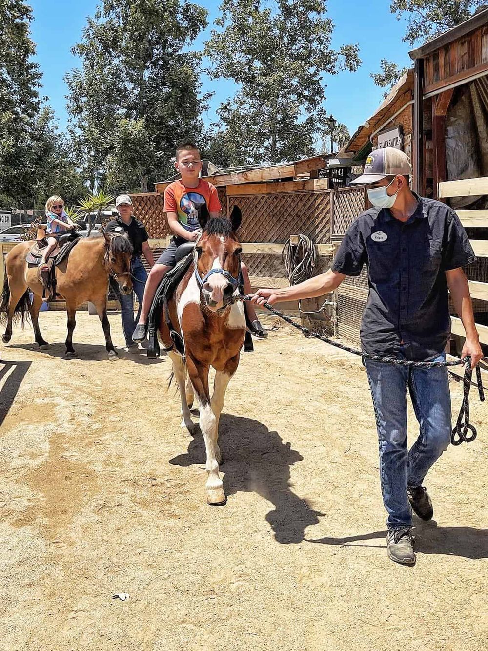 Riders at Quest for Directions horse riding activity, outdoor adventure, kid-friendly fun, equestrian experience.
