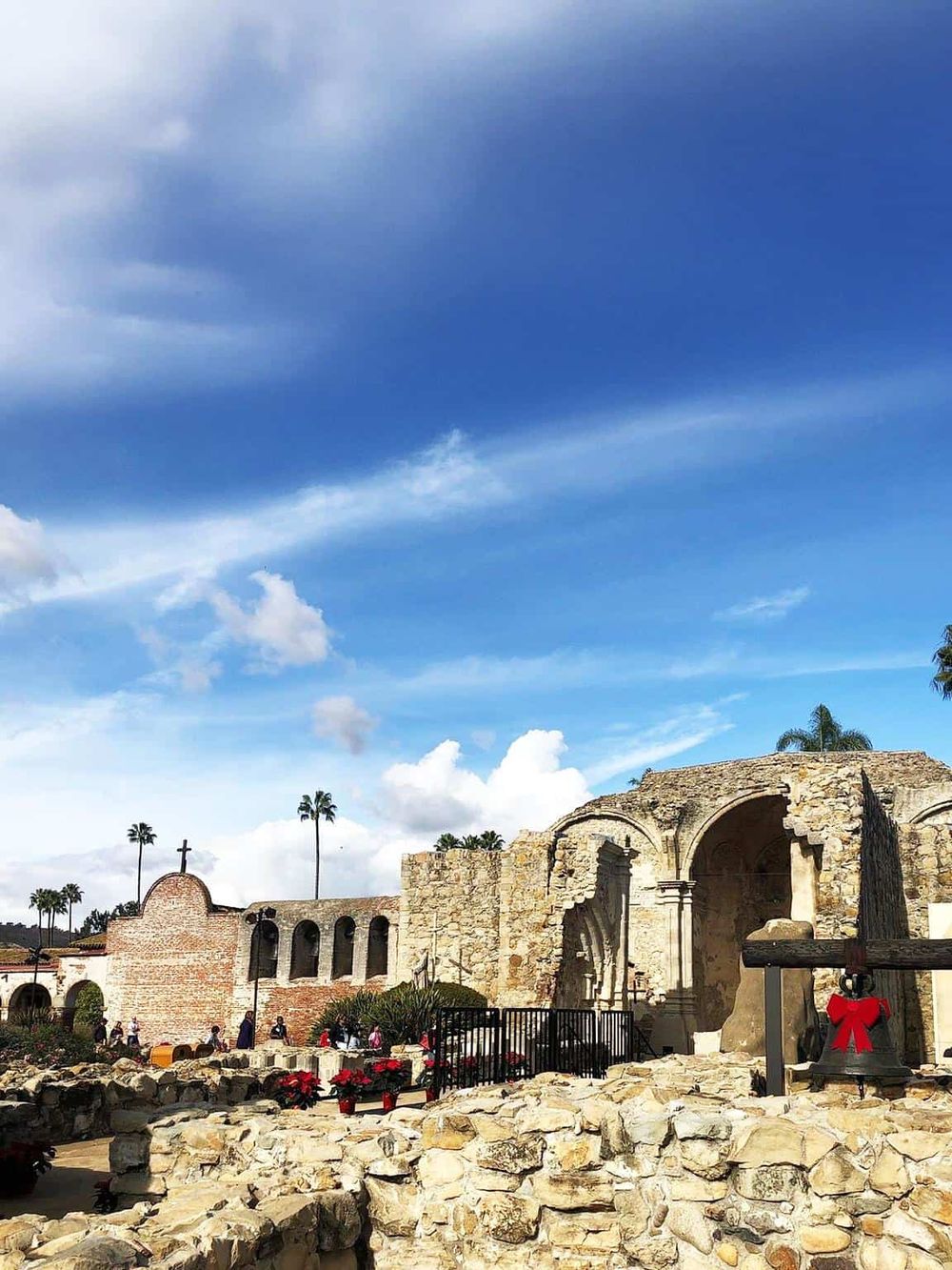 Peaceful historic church ruins under a blue sky, explore scenic destinations with QuestForDirections.