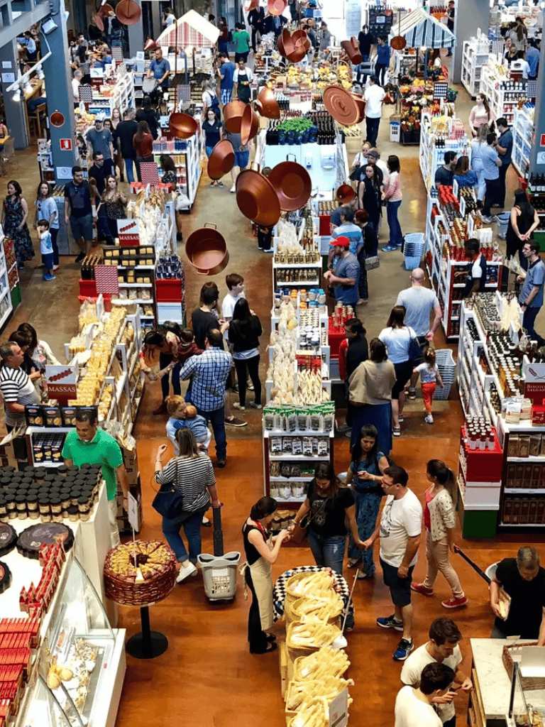 Aisle of diverse products at QuestForDirections shopping event, popular destination for shopping and entertainment.