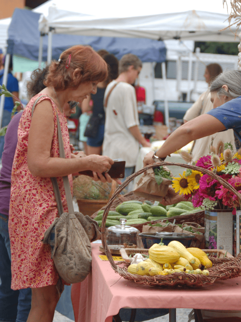 Fresh produce at outdoor farmers market for healthy eating and local shopping.