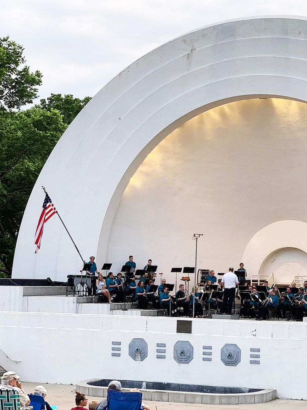 Outdoor concert at the Quest for Directions amphitheater, showcasing live music and community entertainment.