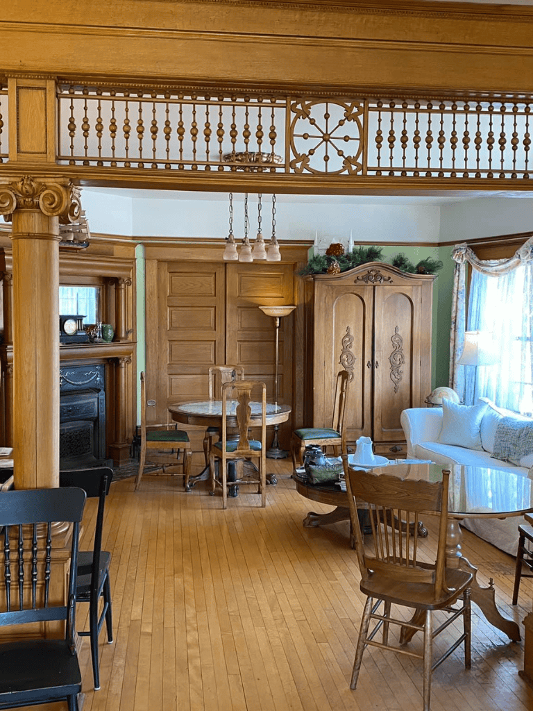 Vintage wooden interior living room with antique furniture and natural light, ideal for home decor inspiration.