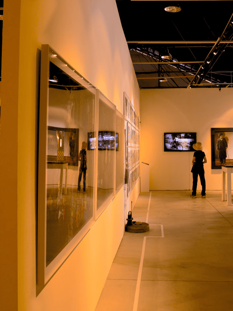 Modern art gallery showcasing contemporary photography and artwork at QuestForDirections exhibit.