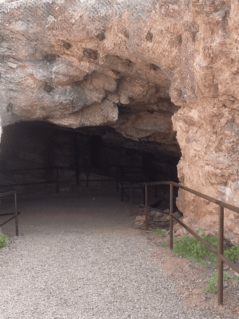 Ancient cave exploration inside Utah's underground tunnels for outdoor adventure and hiking.