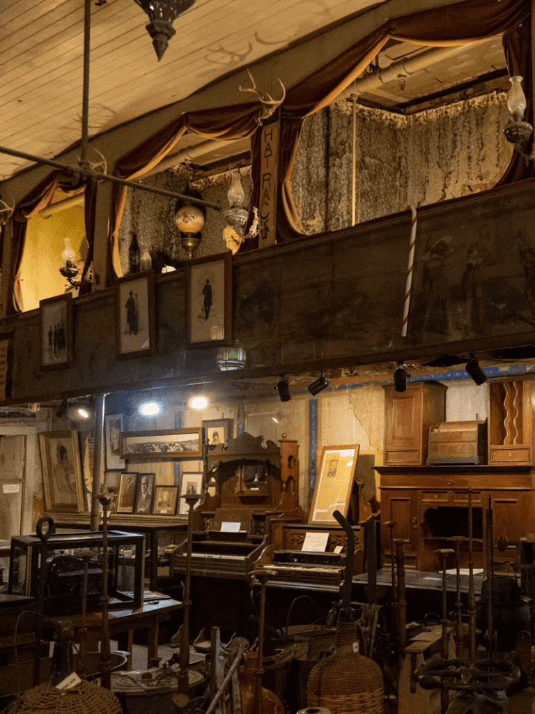 Antique furniture and vintage décor inside a historic shop at QuestForDirections.