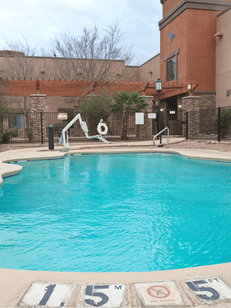 Accessible swimming pool with pool lift at QuestForDirections community.